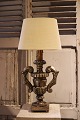 Old French table lamp in carved wood with silver coating on the front and with a 
very fine patina...