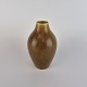 Keramik vase 
med brune og 
gyldne farver. 
No 1116
Producent 
Palshus
Signeret PLS
Højde ...