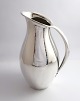 Georg Jensen. 
Sølvkande 
(925). Johan 
Rohde. Design 
432A. Højde 23 
cm. Vægt 560 
gram. 
Produceret ...