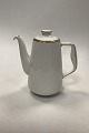 Bing and 
Grondahl Golden 
Sun Coffee Pot 
no 91A
Measures 22cm 
/ 8.66 inch