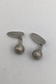 Georg Jensen 
Sterling Sølv 
Manchetknapper 
No. 132 
(Golf-bold) 
Måler Diam 1 cm 
(0.39 inch) 
Samlet ...