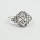 18 kt. 
hvidguldsring i 
art deco stil.
Prydet med to 
større 
diamanter, i 
alt 0.40 ct. W 
VS. Samt ...