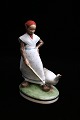 Royal Copenhagen porcelain figure of "goose girl" in overglaze. RC# 528. with 
the Julian mark.