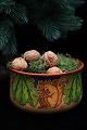 Old Christmas 
bowl in turned 
wood with fine 
old painting 
with a squirrel 
sitting and 
eating ...