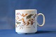 Year mug year 2000, from the hunting frame of Mads Stage. Motif of garden songs.