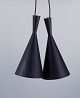 A pair of Tom Dixon, Beat Light Tall pendants, crafted in hammered metal coated 
with a matte alloy.