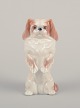 Royal 
Copenhagen, 
porcelænsfigur 
af stående 
pekingeser.
Model 1776. 
Datering: ...