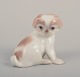 Bing & 
Grøndahl, 
porcelænsfigur 
af pekingeser 
hvalp. 
Model 1987.
Ca. 1930.
Første ...