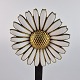 Marguerit 
broche af 
forgyldt 925 
sølv
Uden æske 
Design Viggo 
Pedersen, 
København 1928 
- ...