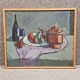 Maleri med 
motiv af et 
bord med frugt, 
vin og en 
kande. Også 
kaldet 
stilleben.
Kunstner Knud 
...