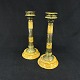 A pair of candlesticks with Egyptian motifs