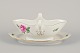 Meissen, 
Germany. Sauce 
boat on a stand 
with a motif of 
...
