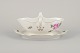 Meissen, 
Germany. Sauce 
boat on a stand 
with a motif of 
...