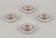 Kähler. Four 
small ceramic 
bowls. Glaze in 
sandy tones 
with a black 
edge.
Approximately 
...