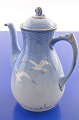 Bing & Grondahl 
porcelain. B&G 
Seagull with 
gold. Coffee 
pot no. 91a. 
Height 24 cm. 
2. Quality, ...