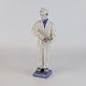 Figur af 
porcelæn, 
forestiller en 
murer med 
værktøj i 
hænderne. Nr. 
4377
Design 
Johannes ...