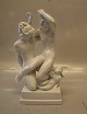 1039 Faun & 
Nymfe og putti 
(Blanc de 
chine)  29 cm 
(Poul Lemser) 
Dahl Jensen. 
Mærket med ...