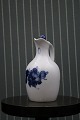 Royal Copenhagen Blue Flower Braided oil jug with lid. 
RC# 10/8201...