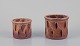 Elly Kuch 
(1929-2008) and 
Wilhelm Kuch 
(1925-2022).
Two unique 
ceramic plant 
pot covers.
Glaze ...