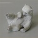 Lyngby 88 
Porcelænsfigur  
liggende 
isbjørneunger 8 
x 11 cm.  
Stemplet med 
Kongelig Krone, 
...