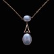 Danish 14k Gold 
Pendant / 
Necklace with 
Moonstones.
Stamped 585
L. 42 cm. / 
16,54 ...