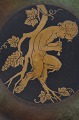Just Andersen 
stort bordfad 
af patineret 
bronze, 
dekoreret med 
motiv af faun. 
Signeret Just 
A. ...