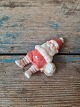 Royal 
Copenhagen 
figur - 
liggende Pixie 
nisse med 
ølkrus 
No. 176, 1. 
sortering
Højde 3 cm. 
...