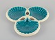 French ceramic 
dish. 
Three-piece. 
Shell-shaped. 
Turquoise and 
cream-colored 
glaze.
Ca. ...