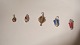 sølv
Heraf 4 med 
emalje 
mariehøne  , 
sko , fisk , 
Den lille 
havfrue