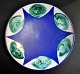 Dansk keramiker 
(20. årh): 
Keramisk skål, 
Rodegaarden. 
Coboltblå og 
grønne 
glasurer. 
Signeret: ...