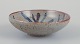 Gutte Eriksen 
for Nymølle, 
small bowl.
Glaze in blue 
and gray tones.
From the 
1970s.
In ...