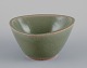 Jais Nielsen 
for Royal 
Copenhagen.
Ceramic bowl 
in green glaze. 
Crackled. Motif 
of mythical ...