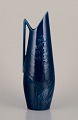 Rörstrand, 
large pitcher 
in porcelain.
Floral motifs. 
Blue glaze.
Handmade.
In perfect ...