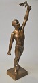 Dansk kunstner 
(20. årh.): En 
atlet. Stående 
figur. 
Patineret 
bronze. 
Usigneret. H. 
33 cm. 