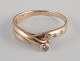Dansk guldsmed. 
8 karat 
guldring.
Prydet med 
fire 
brillanter.
Midt 
1900-tallet.
Stemplet SC / 
...