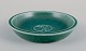 Saxbo, Denmark. 
Small ceramic 
bowl featuring 
a motif of a 
standing bear.
Glaze in green 
...