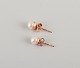 Swedish 
goldsmith. A 
pair of classic 
ear studs in 18 
...