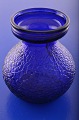 Blomsterløgs-
vase af 
maskinblæst 
presset glas 
med 
net-mønster, 
Fyens glasværk 
fra år 1924- . 
...