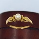 Georg Jensen 
guld smykke.
Georg Jensen; 
Ring af 18 kt. 
guld,
prydet med 
perle. Fra 
1930.
Ring ...