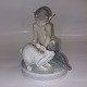 Porcelænsfigur 
af pan / faun 
med kanin. 
Designet af 
Christian 
Thomsen. 
Modelnummer 
439.  ...