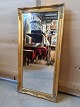Guldmalet 
spejl, fra 
1990erne.
Det har små 
brugsspor.
Højde 100cm 
Bredde 50cm