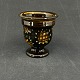 Højde 10 cm.
Fint bæger 
eller vase fra 
1920'erne fra 
Kähler.
Vasen er 
dekoreret med 
gult ...