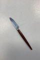 Holland 
Stainless 
Frugt- eller 
ostekniv med 
mørkebrunt 
træskaft. Måler 
17,2 cm / 6,77 
in.