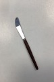 Cutlass 
Leppington 
Sheffield 
Stainless 
Spisekniv med 
mørkebrunt 
træskaft. Måler 
22,3 cm / 8,77 
...