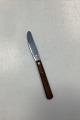 Raadvad Rustfri 
Spisekniv med 
mørkebrunt 
træhåndtag. I 
god stand. 
Måler 21,6 cm 
/ 8,50 in.