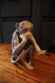 Bing & Grondahl 
porcelain 
figure of a 
sitting monkey 
holding a small 
turtle. Height: 
13cm. ...