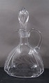 Oval carafe 
with grindings 
and the 
original 
stopper from 
Denmark. 
The carafe is 
in a good ...