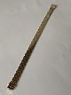 Elegant og 
klassisk 
guldarmbånd i 
mursten i 14 
karat guld. 
Armbåndet har 
desuden 
kasselås, som 
...