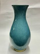 Vase i porcelæn 
fra Royal 
Cooenhagen med 
blå krakkelé 
dekoration. 
Fremstår i god 
stand. Ingen 
...