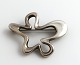 Georg Jensen. 
Sterling broshe 
"Splash". 
Henning Koppel. 
Model 321. 
Længde 4,5 cm